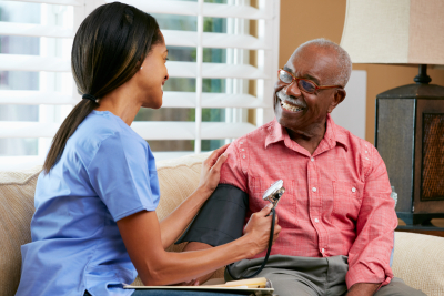 nurse taking blood pressure